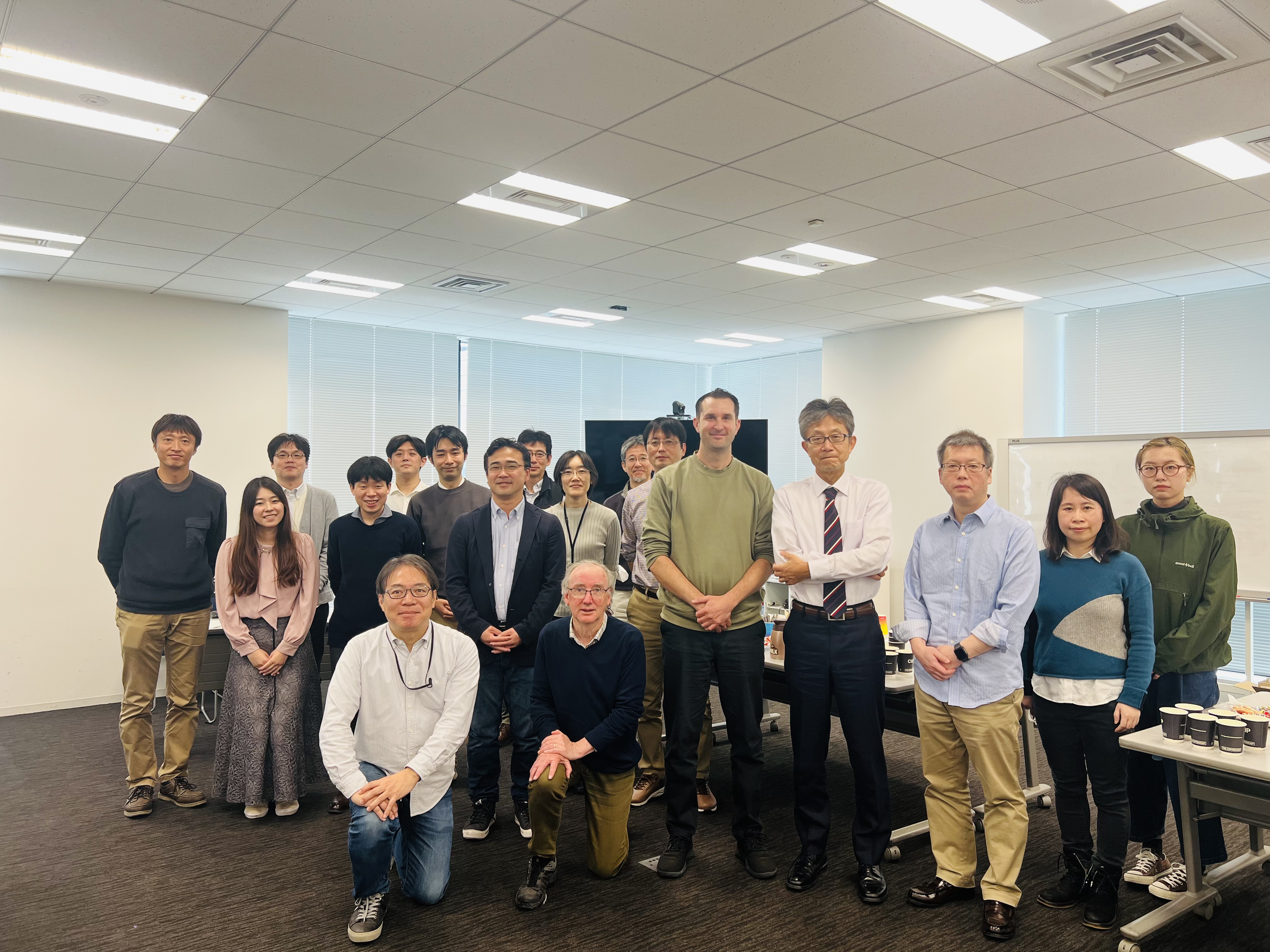 Group photo with workshop participants at NIED Tokyo office